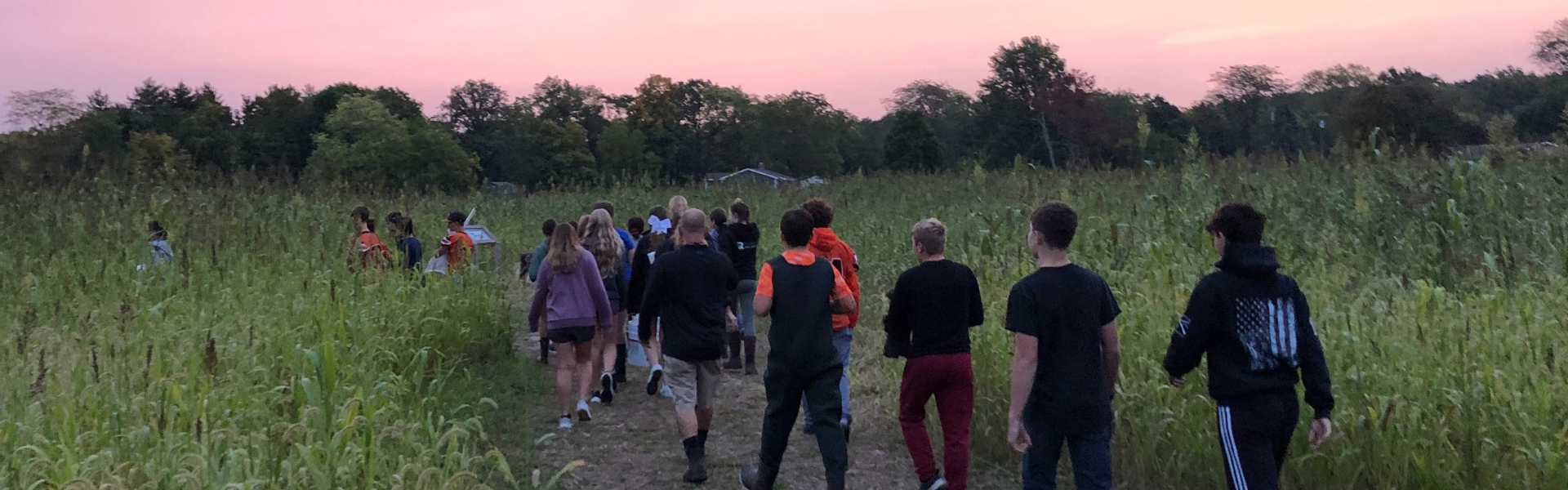 Students walking across Fox-Shank Living Laboratory